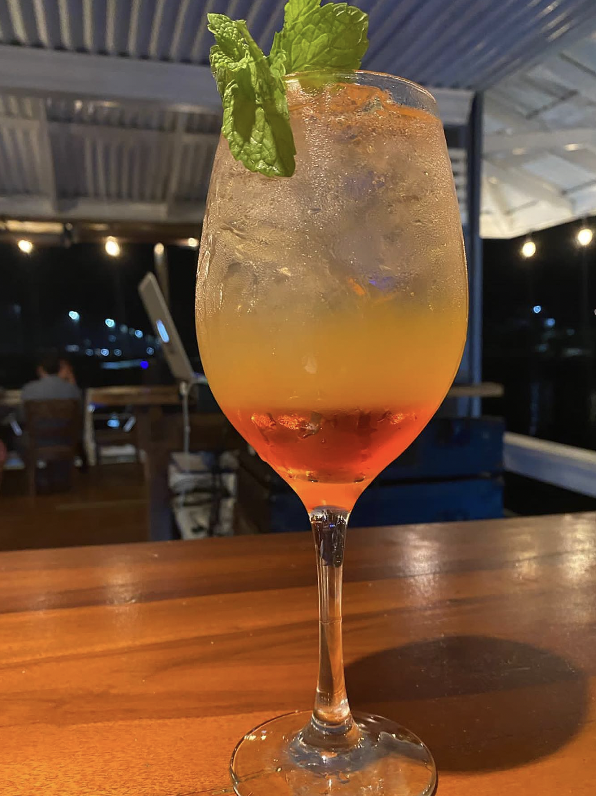 Captain Jack's signature piña colada with fresh garnish