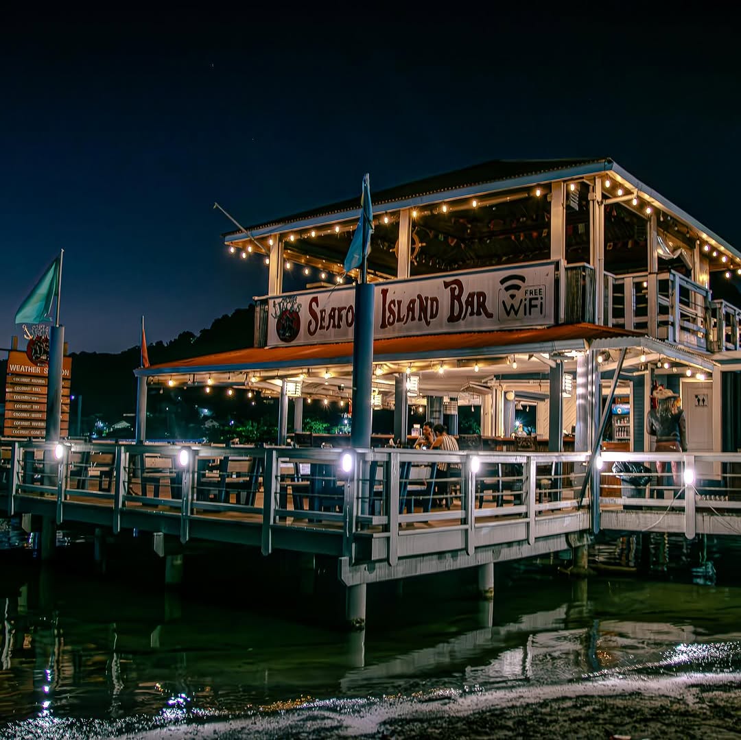 The Island Bar lit up at night